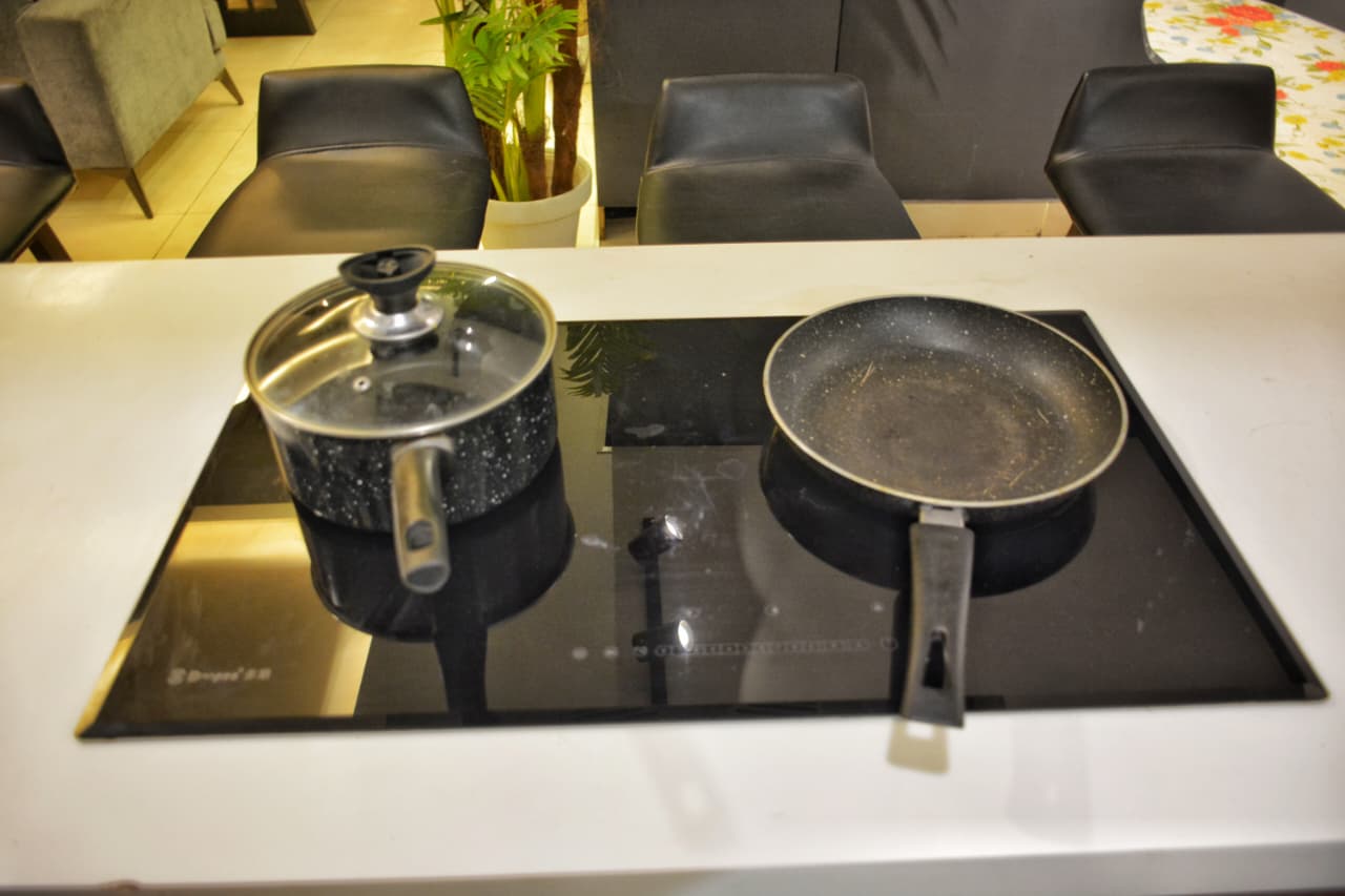 Black bar stools at kitchen counter
