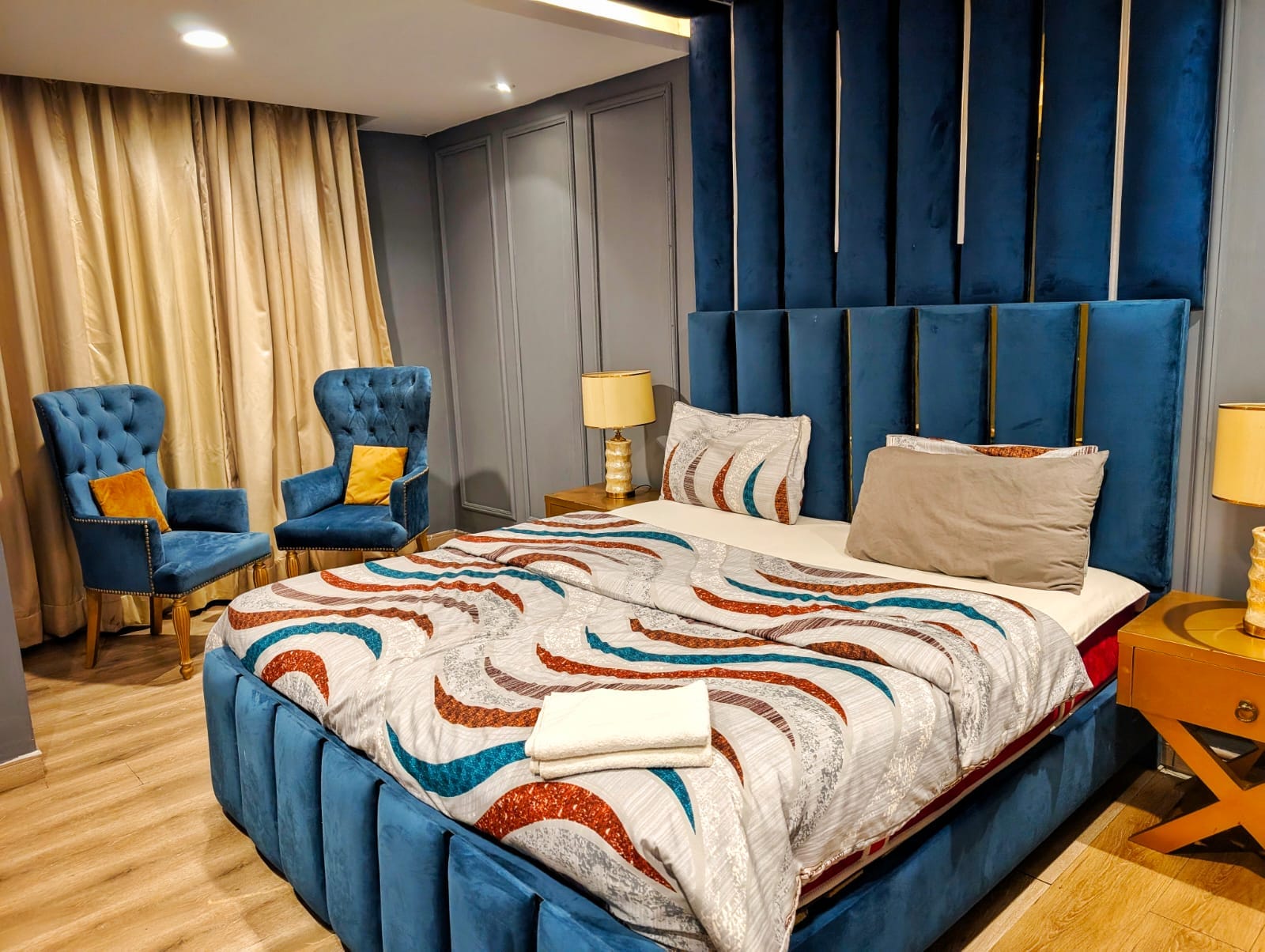 Black headboard with gold tree detail