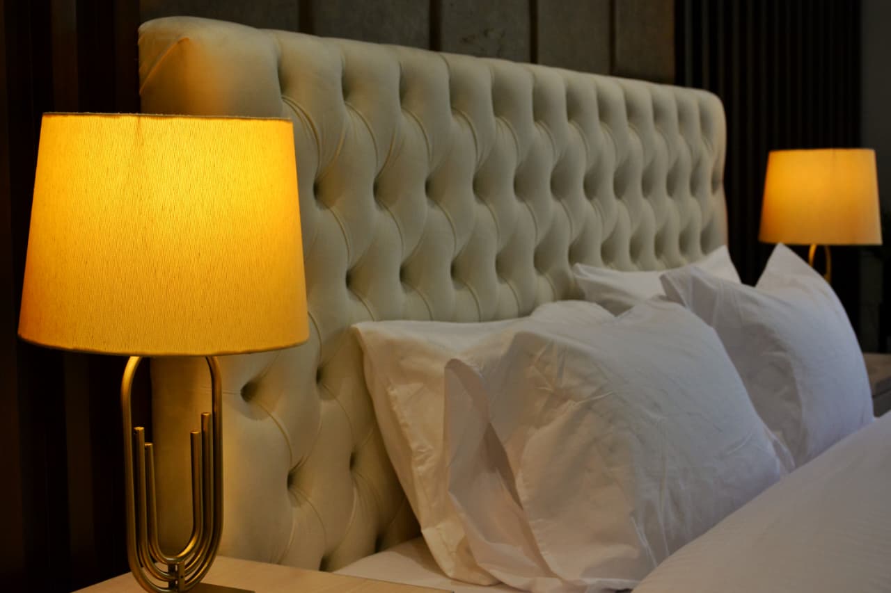 cushioned back of bed